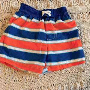 OP 0-3 months blue and‎ orange striped swim trunks​